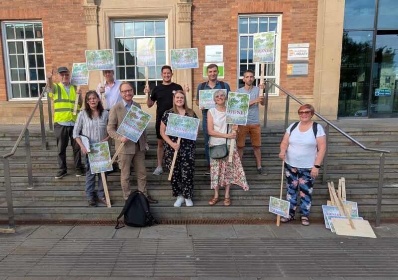 Jonathan Davies MP alongside local councillors and activists from Friends of Chaddesden Wood.