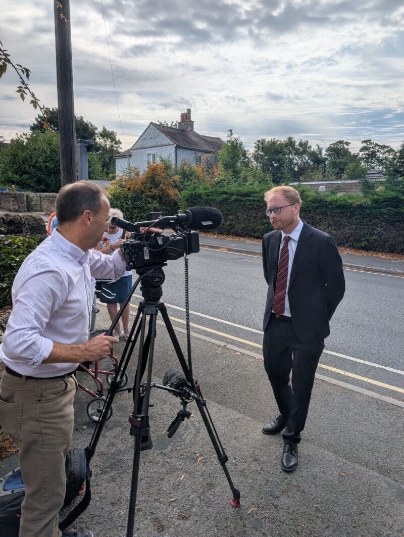 Jonathan Davies MP in front of the old Ada Belfield Centre