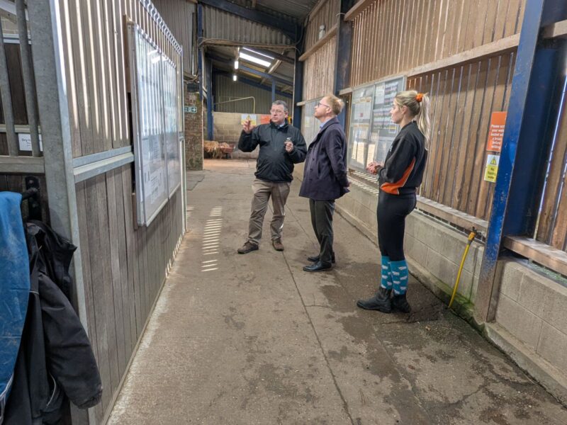 Jonathan Davies MP being show inside the stables at Broomfield College.