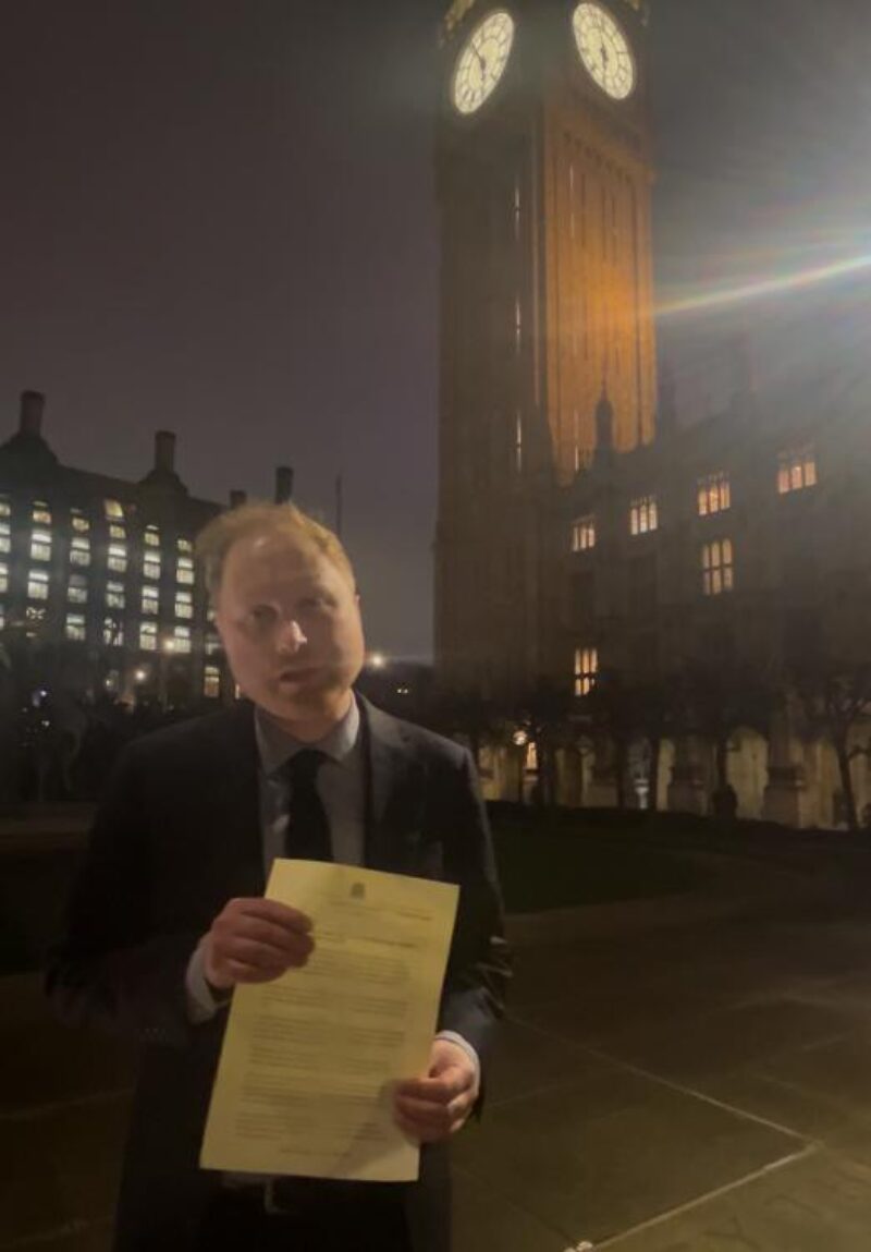 Jonathan Davies MP with letter signed by cross-party MPs calling on the government to ban social media usage for under 16s.