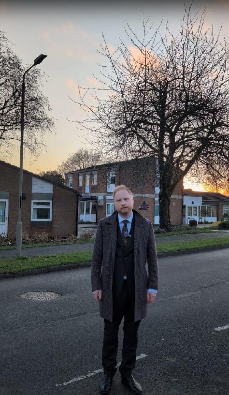 Jonathan Davies MP outside Briar Close House.